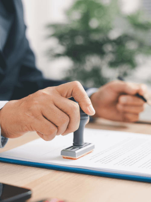 lawyer stamping a document