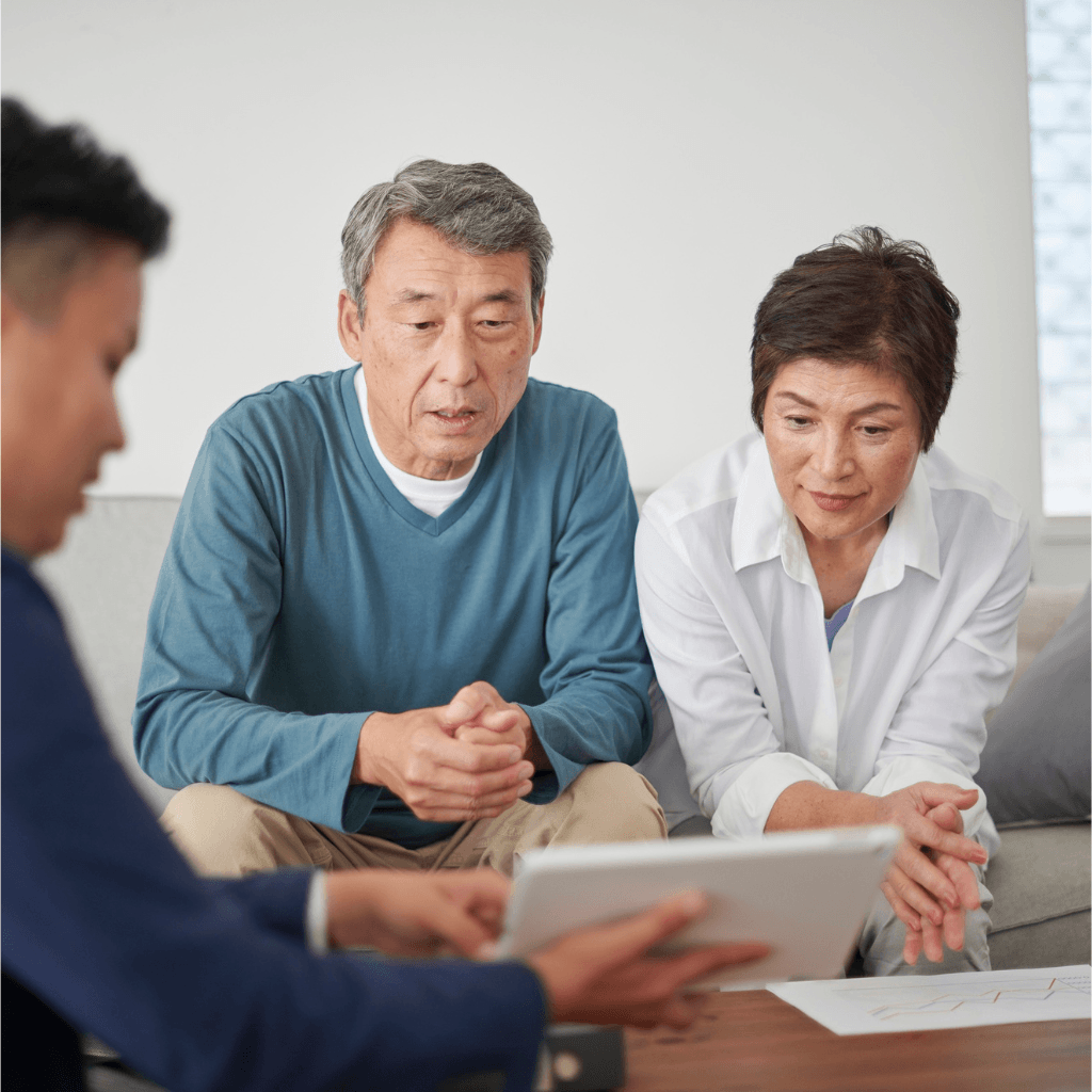couple reviewing information with an advisor